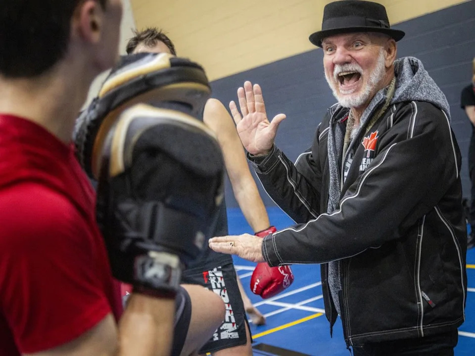  Chantal Theriault’s uncle, Vic Theriault, smiles as he helps participants during the Kick It for Parkinson’s fundraiser.