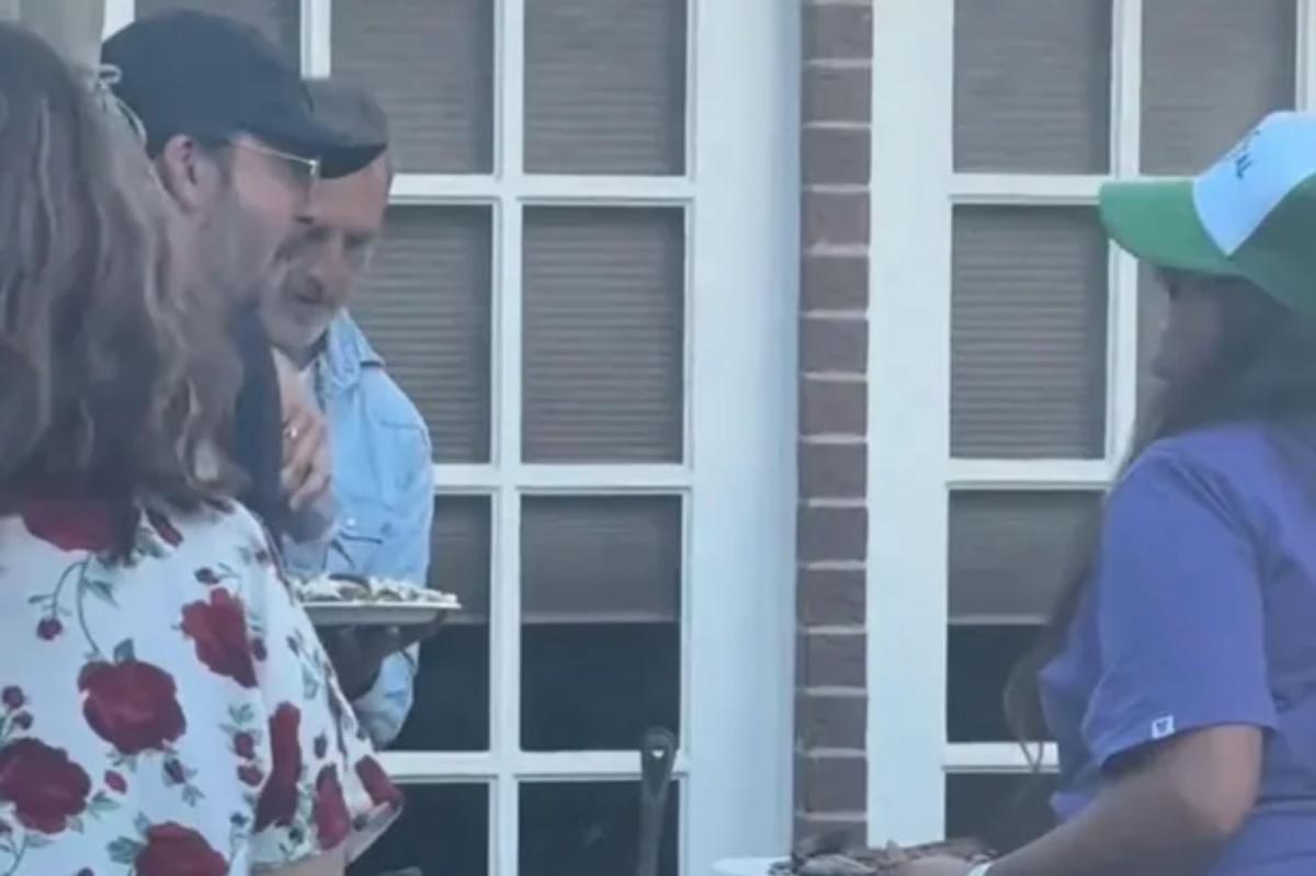 Foo Fighters frontman Dave Grohl surprises guests by serving BBQ at LA backyard bash