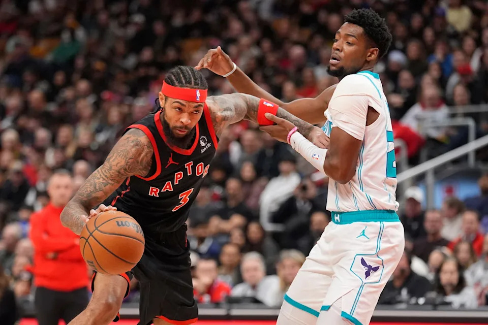 Toronto Raptors forward Brandon Ingram (3) drives to the net against Charlotte Hornets guard Brandon Miller (24) during the first half at Scotiabank Arena.
