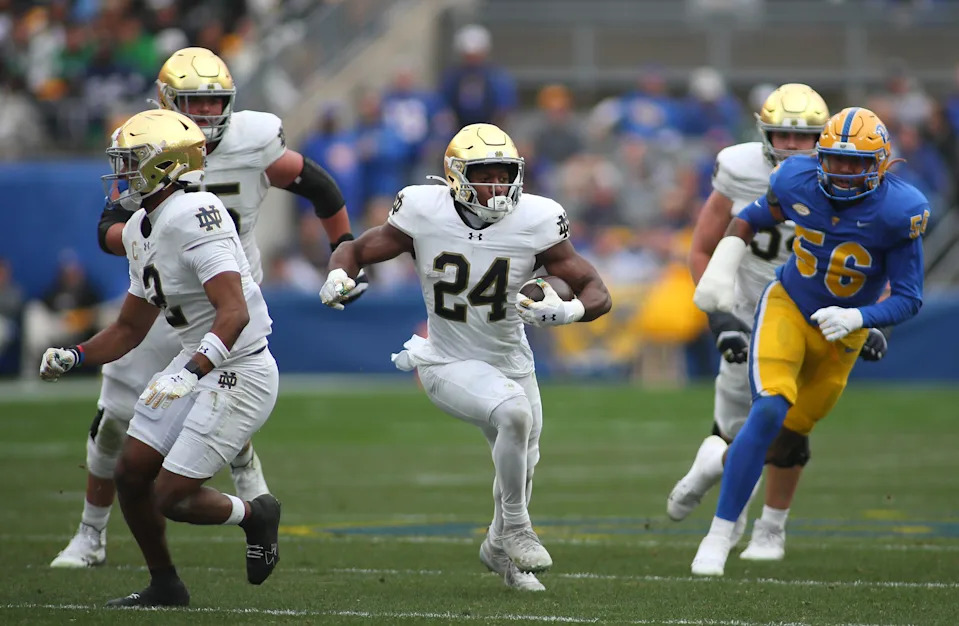 Notre Dame Fighting Irish running back Jadarian Price (24) sprints downfield after finding a hole in the Pittsburgh Panthers defensive line during the first half at Acrisure Stadium in Pittsburgh, PA on November 15, 2025.