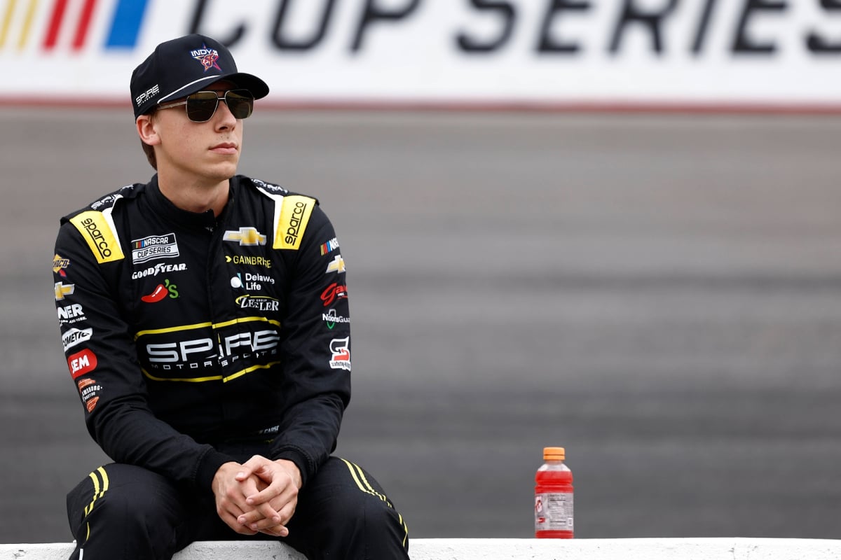 An image of Spire Motorsports NASCAR driver Carson Hocevar pre-race
