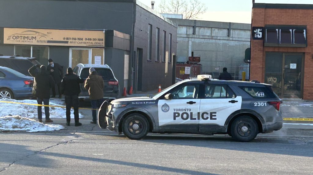 Police investigate a shooting at a business near Belfield Road and Kipling Avenue in Etobicoke on March 2, 2026