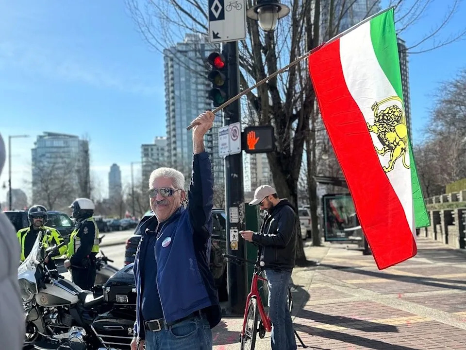  Iranian Canadians and supporters rally in Vancouver after news that Iran’s supreme leader is dead Saturday.