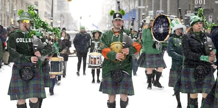  The Ottawa Caledonian Pipes and Drums dress for the occasion as they take part in the St. Patrick’s Parade in Montreal on Sunday, March 22, 2026.