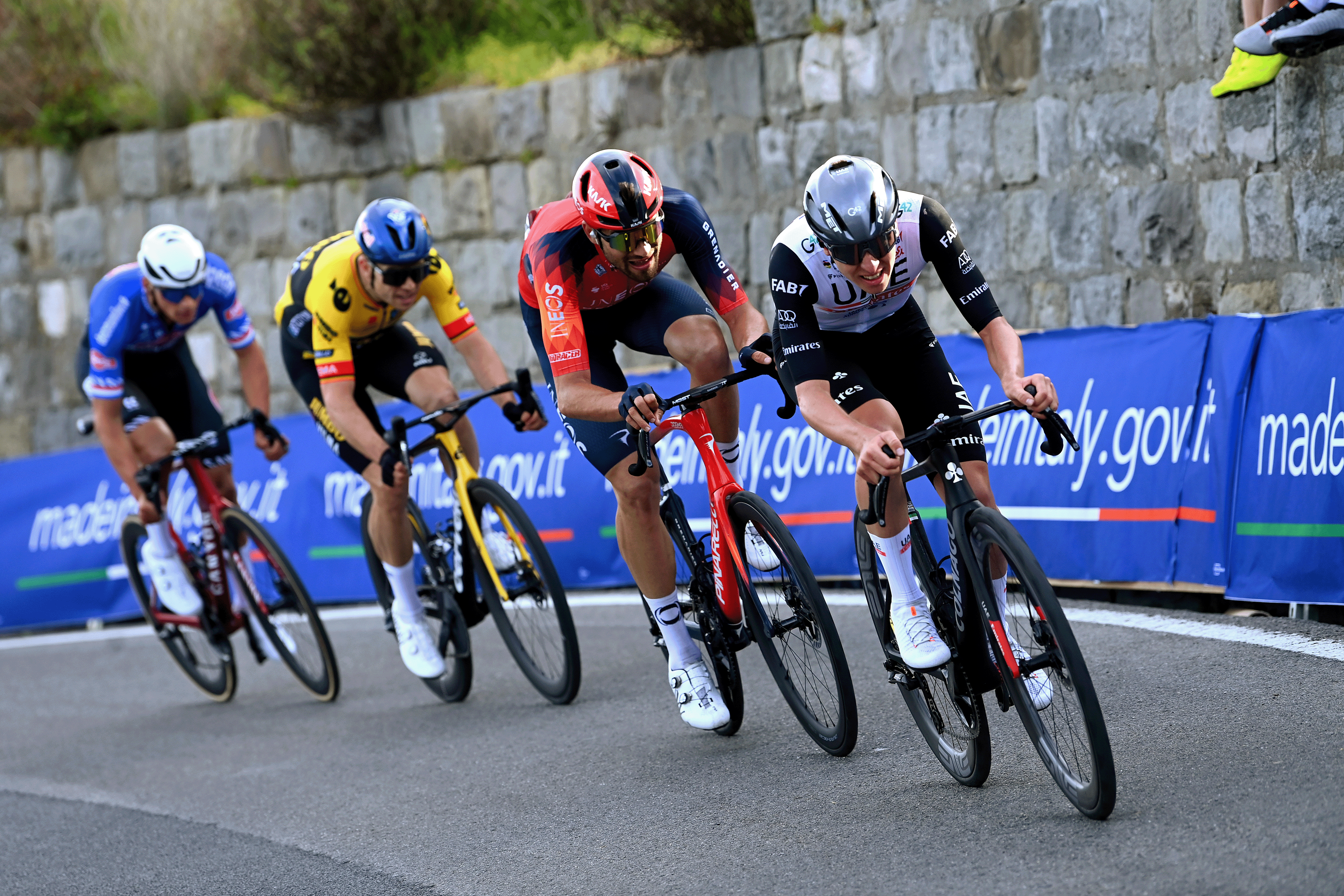 SANREMO, ITALY - MARCH 18: (L-R) Mathieu Van Der Poel of The Netherlands and Team Alpecin-Deceuninck, Wout Van Aert of Belgium and Team Jumbo &ndash; Visma, Filippo Ganna of Italy and Team INEOS Grenadiers and Tadej Pogacar of Slovenia and UAE Team Emirates compete in the breakaway in the Poggio di Sanremo during the 114th Milano-Sanremo 2023 a 294km one day race from Abbiategrasso to Sanremo / #MilanoSanremo / #UCIWT / on March 18, 2023 in Sanremo, Italy. (Photo by Tim de Waele/Getty Images)