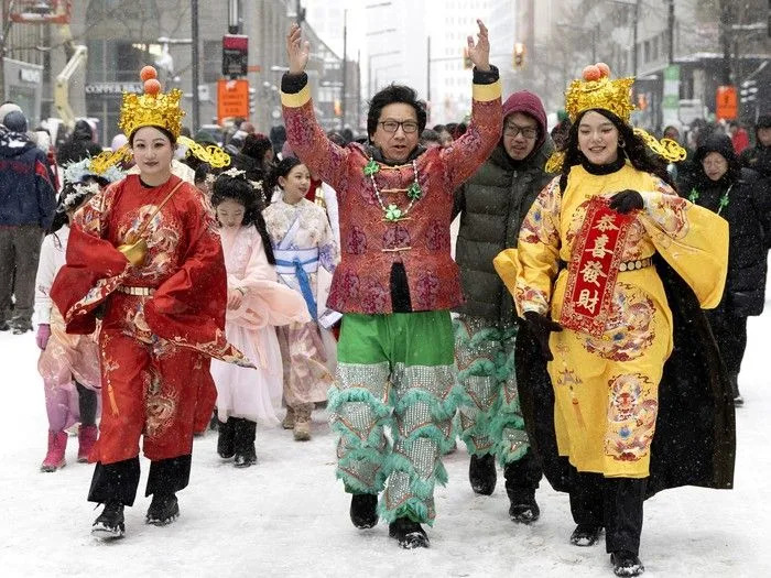  Members of Montreal’s Chinese community take part in the St. Patrick’s Parade on Sunday, March 22, 2026.