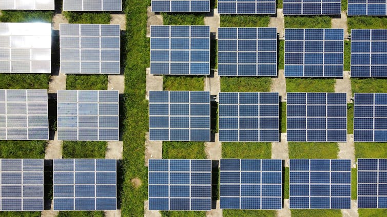 an aerial view of a group of solar panels