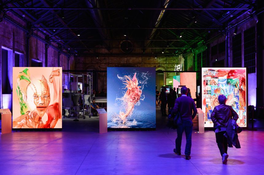 Digital artworks on show at the Italian Tech Week forum in Turin, Italy, in September 2022, by which time monthly NFT trading volumes had reportedly fallen by 97%.