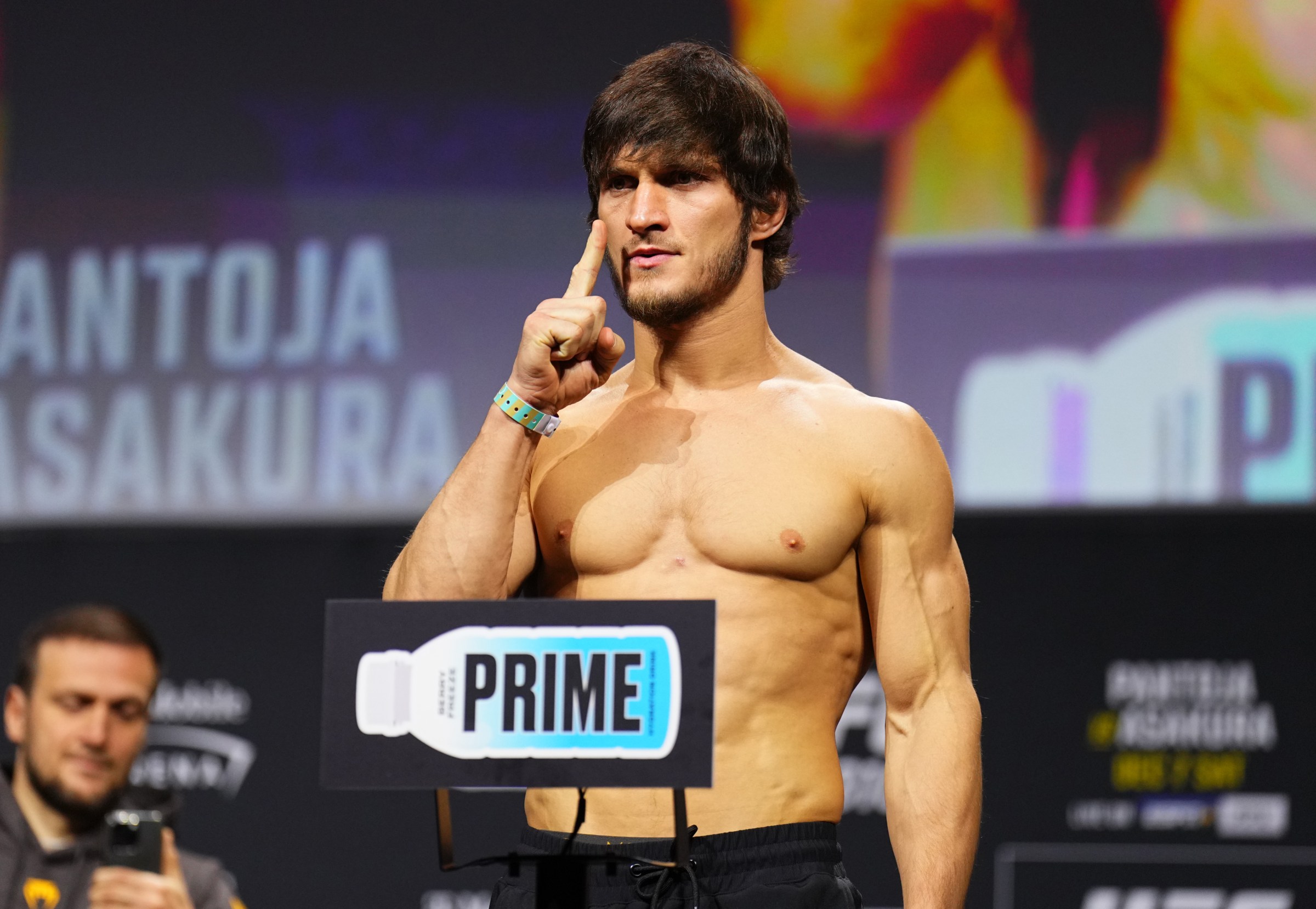 LAS VEGAS, NEVADA - DECEMBER 06: Movsar Evloev of Russia poses on the scale during the UFC 310 ceremonial weigh-in at MGM Grand Garden Arena on December 06, 2024 in Las Vegas, Nevada. (Photo by Chris Unger/Zuffa LLC)