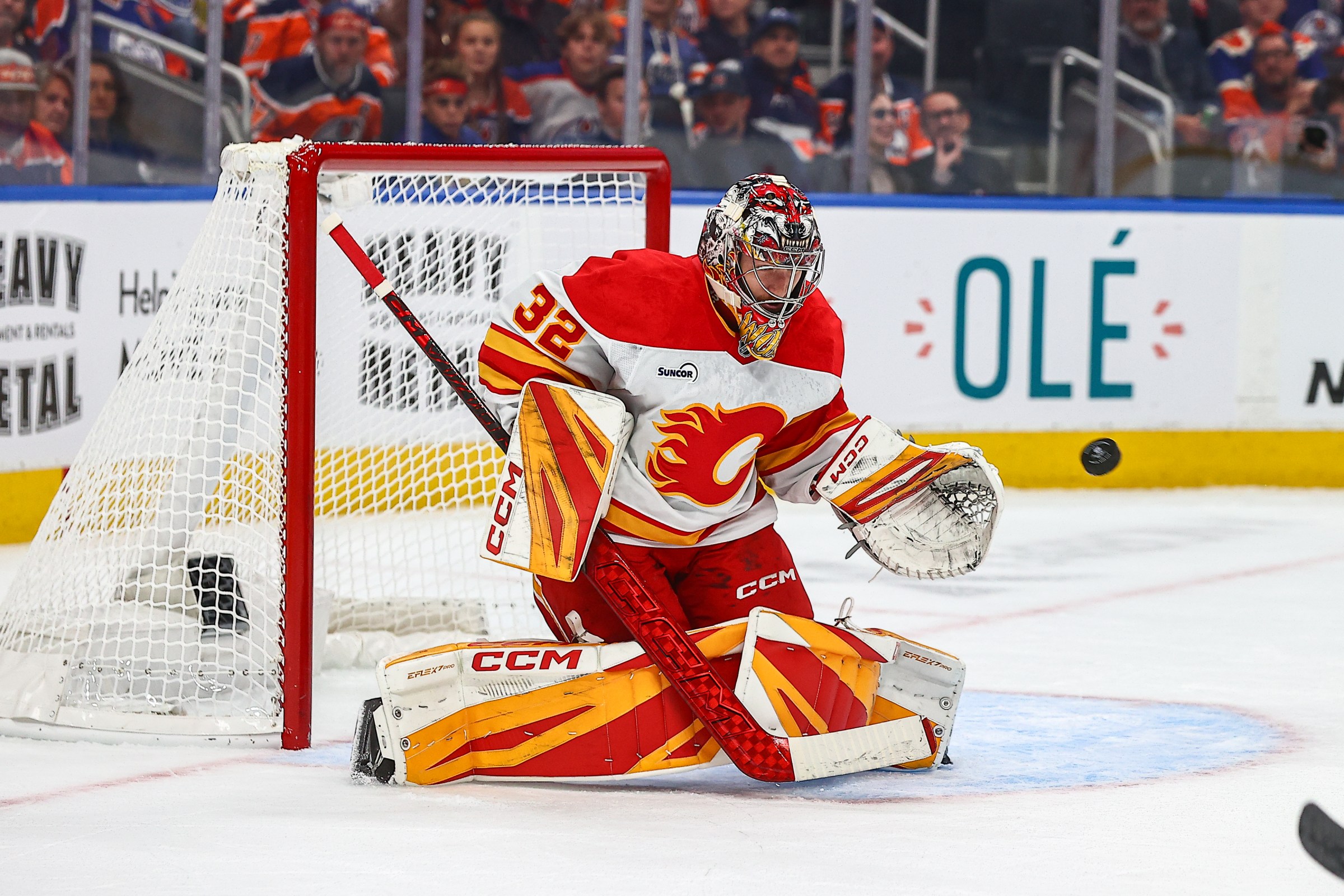 EDMONTON, AB - OCTOBER 08: Calgary Flames Goalie Dustin Wolf (32) makes a save in the first period of the Edmonton Oilers game versus the Calgary Flames on October 8, 2025 at Rogers Place in Edmonton, AB. (Photo by Curtis Comeau/Icon Sportswire via Getty Images)