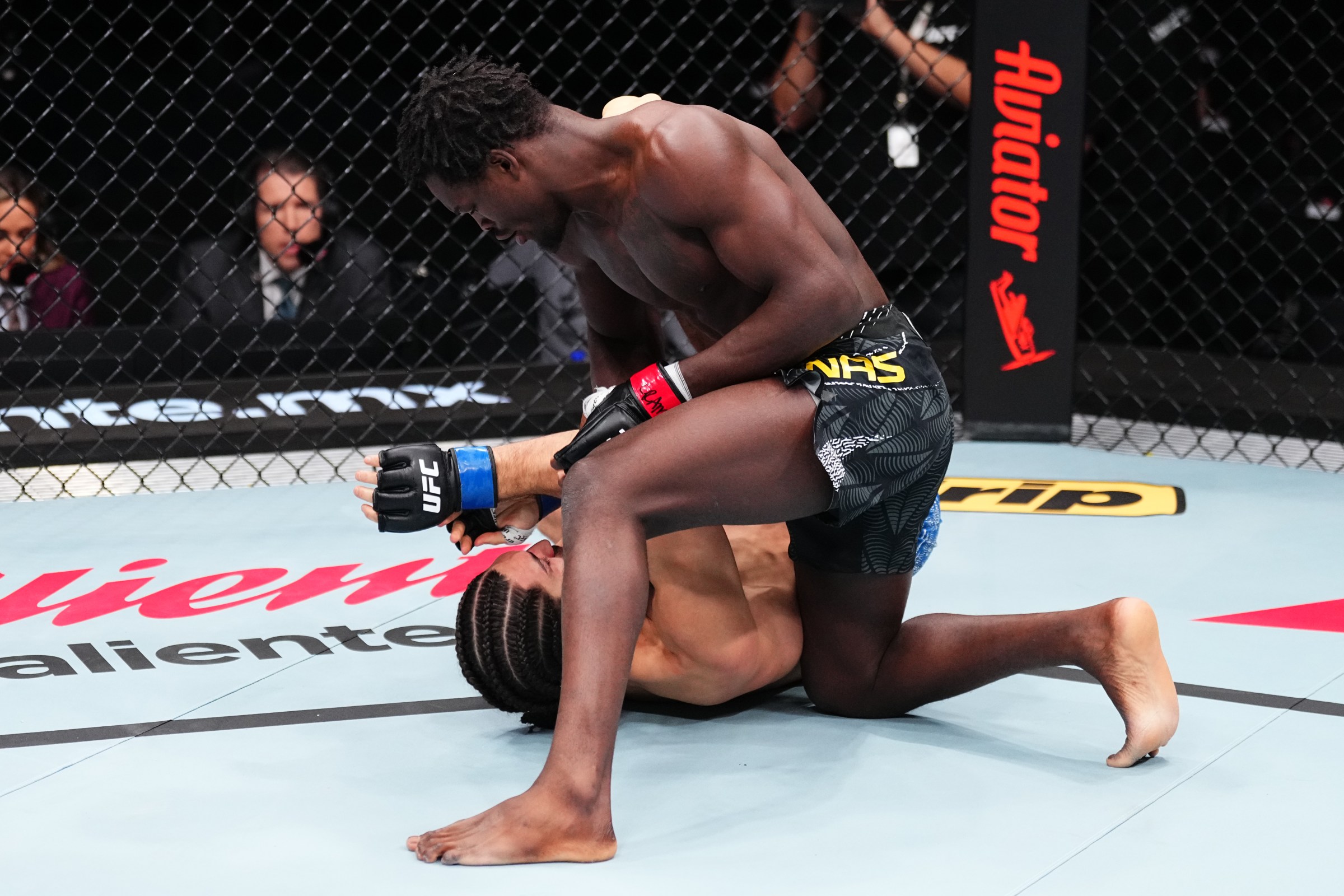 MEXICO CITY, MEXICO - FEBRUARY 28: (R-L) Damian Pinas of Suriname punches Wes Schultz in a middleweight fight during the UFC Fight Night event at Arena CDMX on February 28, 2026 in Mexico City, Mexico. (Photo by Jeff Bottari/Zuffa LLC)