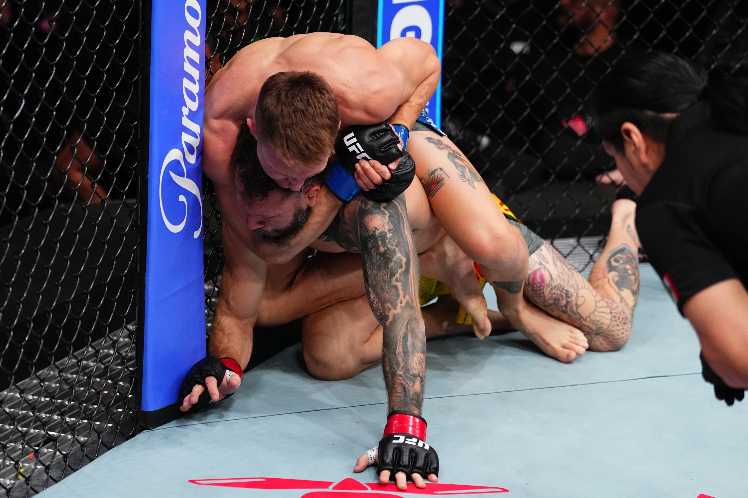 MEXICO CITY, MEXICO - FEBRUARY 28: Francis Marshall secures a rear choke submission against Erik Silva of Venezuela in a featherweight fight during the UFC Fight Night event at Arena CDMX on February 28, 2026 in Mexico City, Mexico. (Photo by Jeff Bottari/Zuffa LLC)