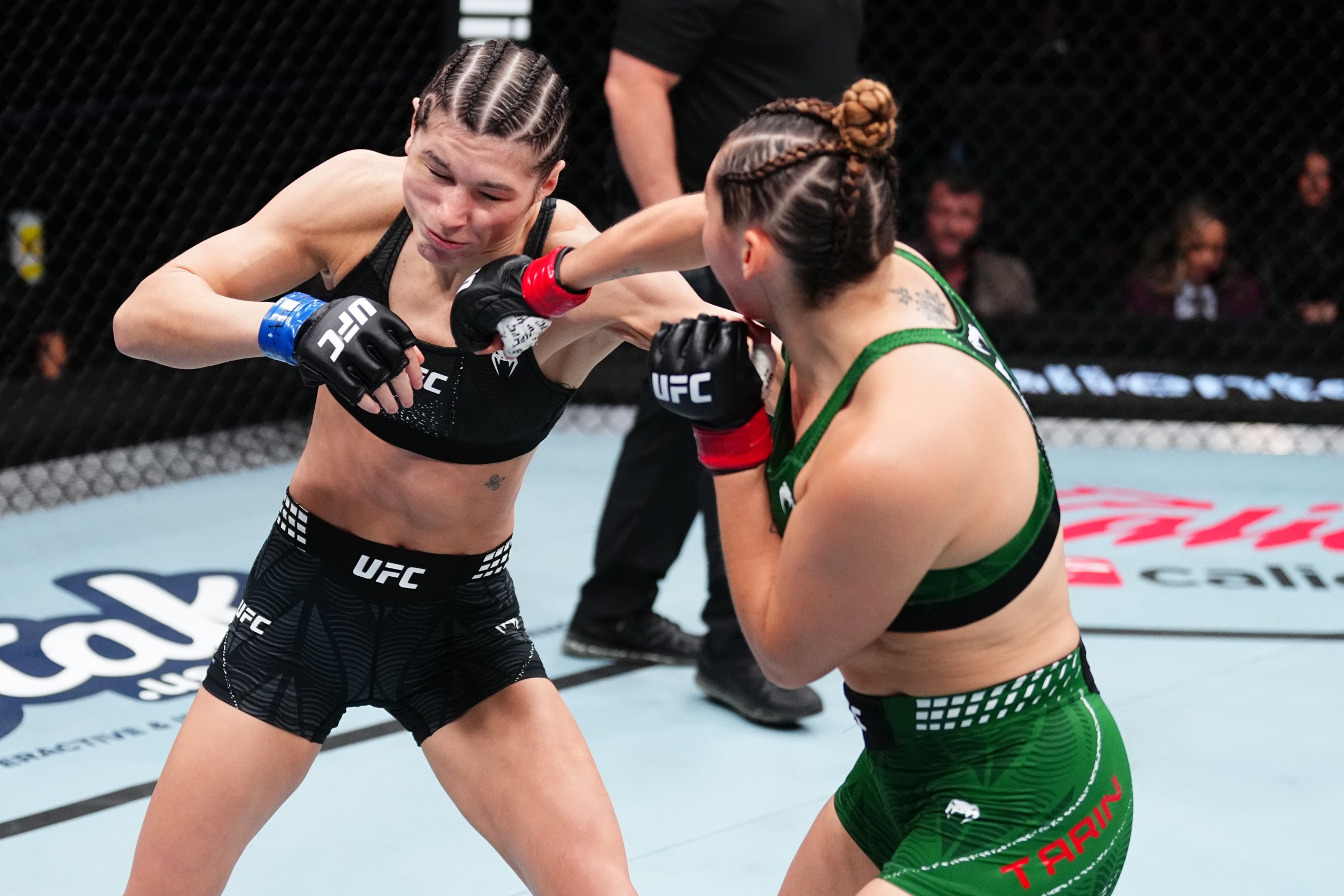 MEXICO CITY, MEXICO - FEBRUARY 28: (R-L) Regina Tarin of Mexico punches Ernesta Kareckaite of Lithuania in a catchweight fight during the UFC Fight Night event at Arena CDMX on February 28, 2026 in Mexico City, Mexico. (Photo by Jeff Bottari/Zuffa LLC)