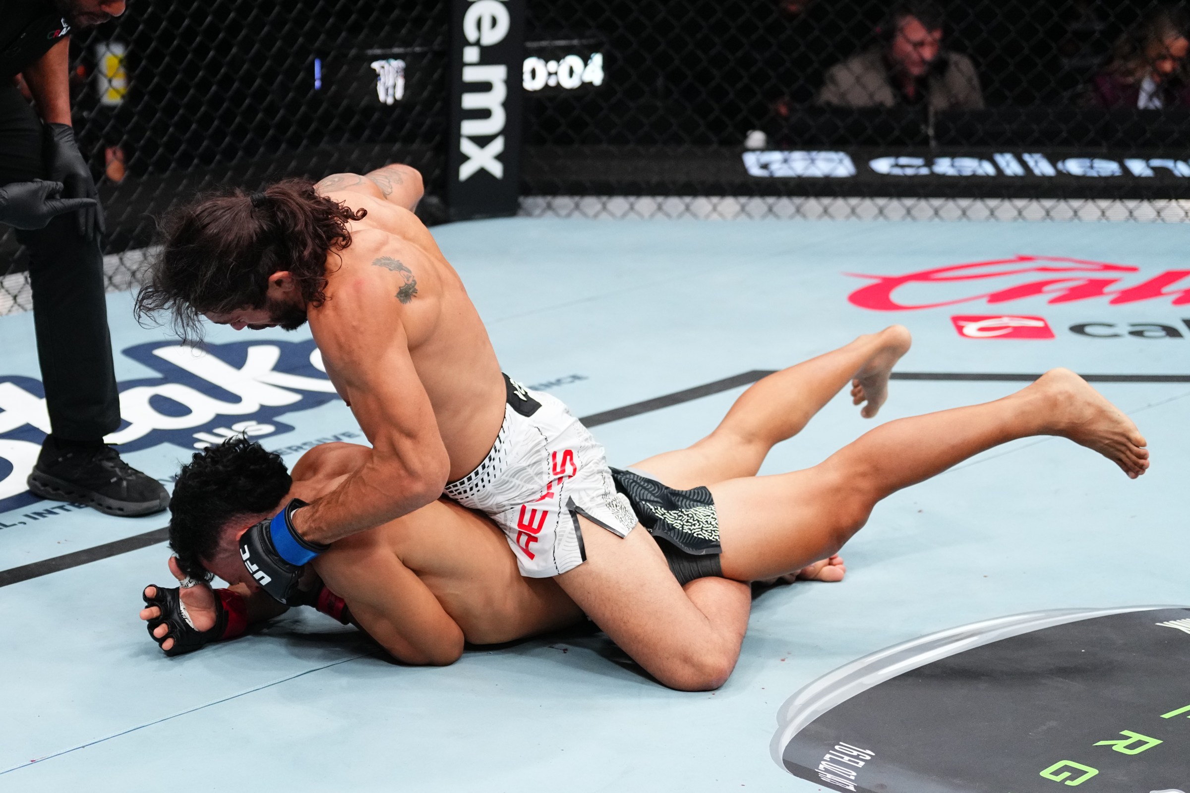 MEXICO CITY, MEXICO - FEBRUARY 28: (R-L) Javier Reyes of Colombia punches Douglas Silva de Andrade of Brazil in a featherweight fight during the UFC Fight Night event at Arena CDMX on February 28, 2026 in Mexico City, Mexico. (Photo by Jeff Bottari/Zuffa LLC)