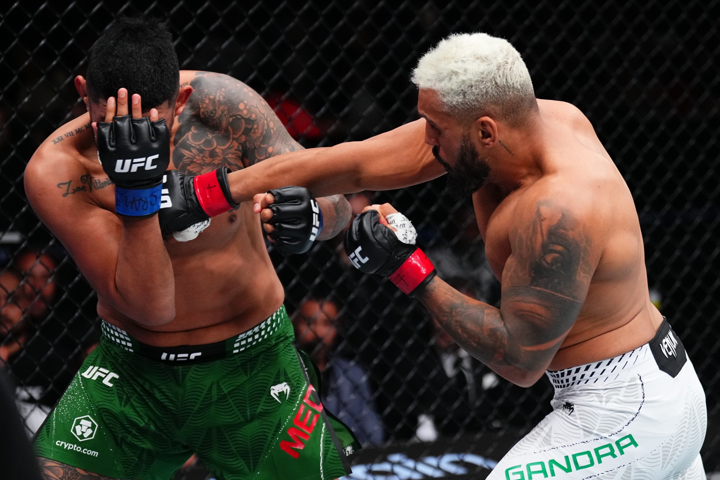 MEXICO CITY, MEXICO - FEBRUARY 28: (R-L) Ryan Gandra of Brazil punches Jose Daniel Medina of Bolivia in a middleweight fight during the UFC Fight Night event at Arena CDMX on February 28, 2026 in Mexico City, Mexico. (Photo by Jeff Bottari/Zuffa LLC)