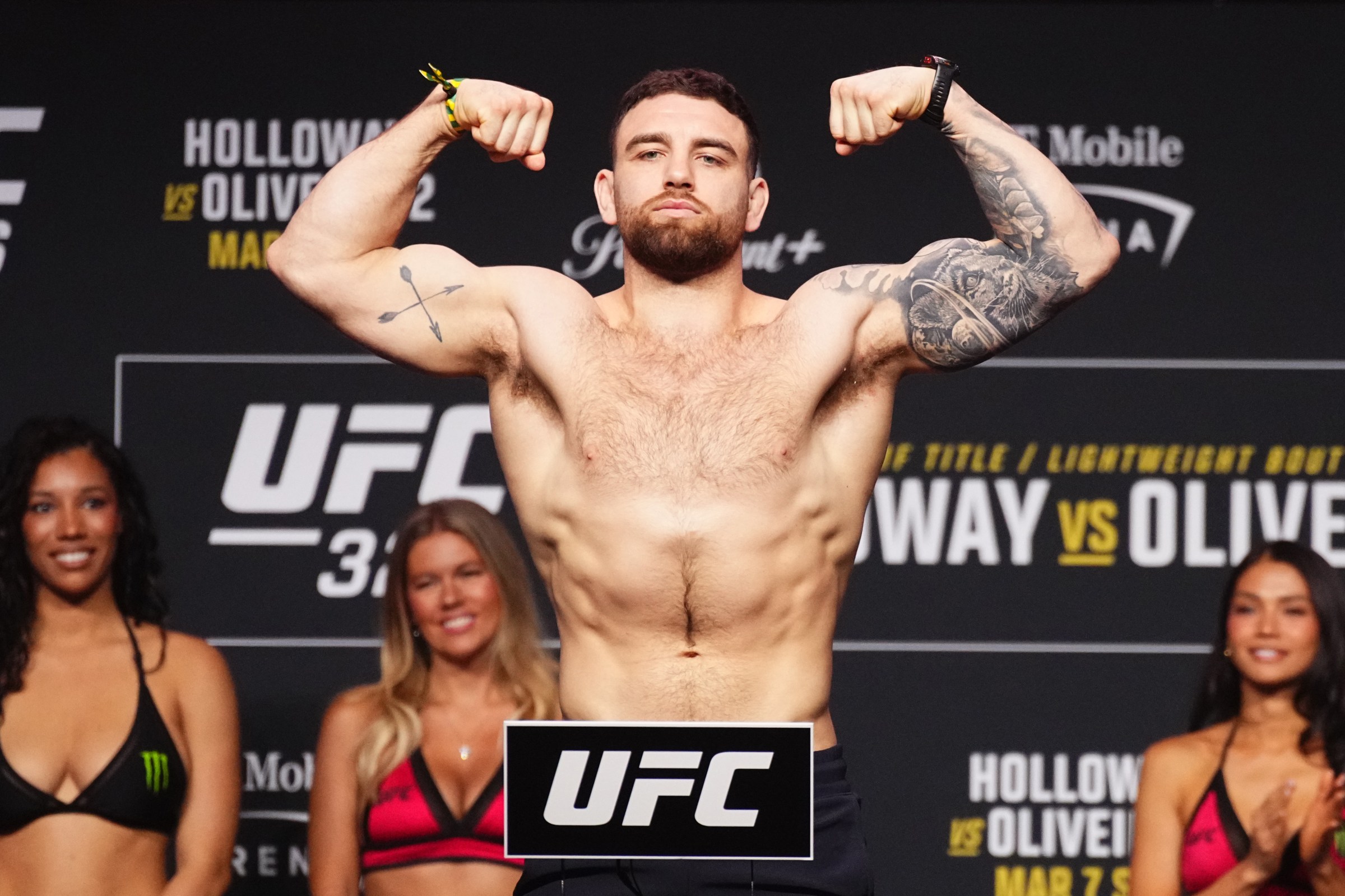 LAS VEGAS, NEVADA - MARCH 06: Luke Fernandez poses on the scale during the UFC 326 ceremonial weigh-in at MGM Grand Garden Arena on March 06, 2026 in Las Vegas, Nevada. (Photo by Jeff Bottari/Zuffa LLC)