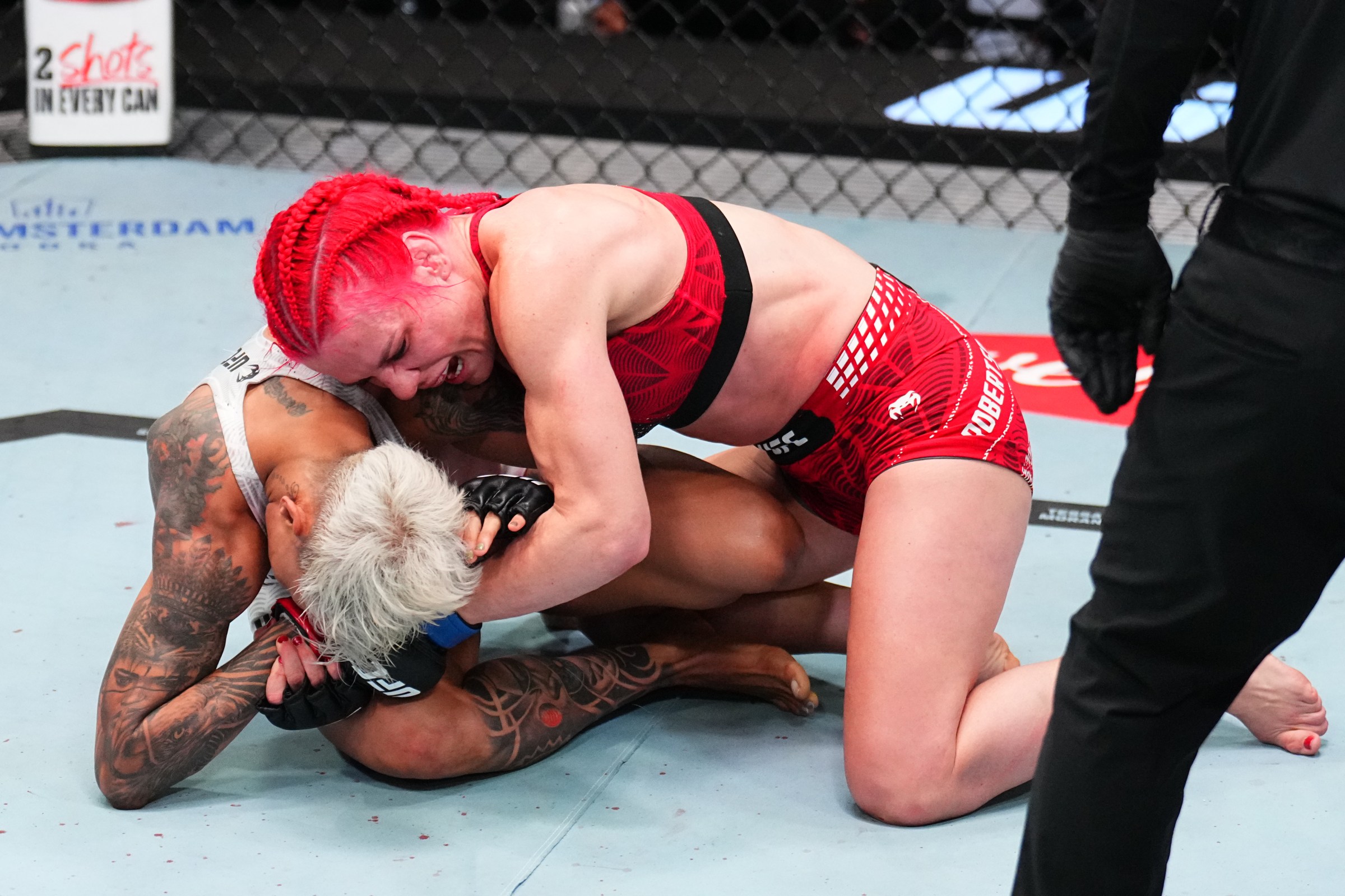 LAS VEGAS, NEVADA - MARCH 14: (R-L) Gillian Robertson of Canada punches Amanda Lemos of Brazil in a strawweight fight during the UFC Fight Night event at Meta APEX on March 14, 2026 in Las Vegas, Nevada. (Photo by Chris Unger/Zuffa LLC)