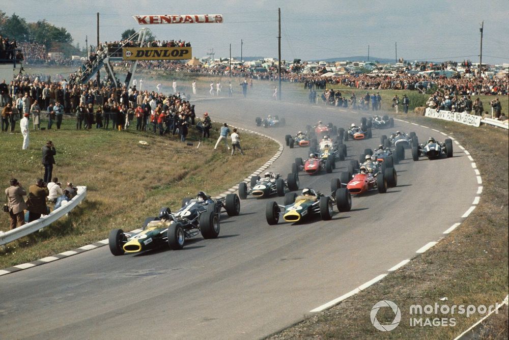 Graham Hill, Lotus 49 Ford leads