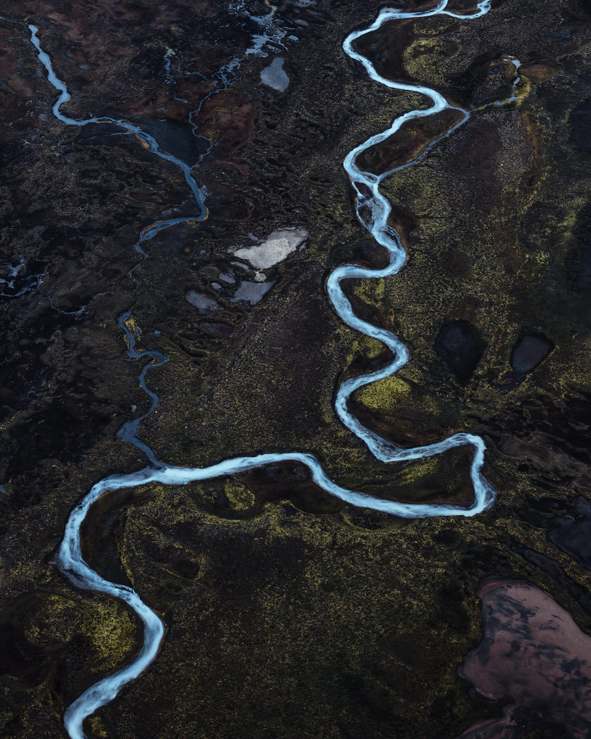 An aerial landscape of glacial streams in Iceland