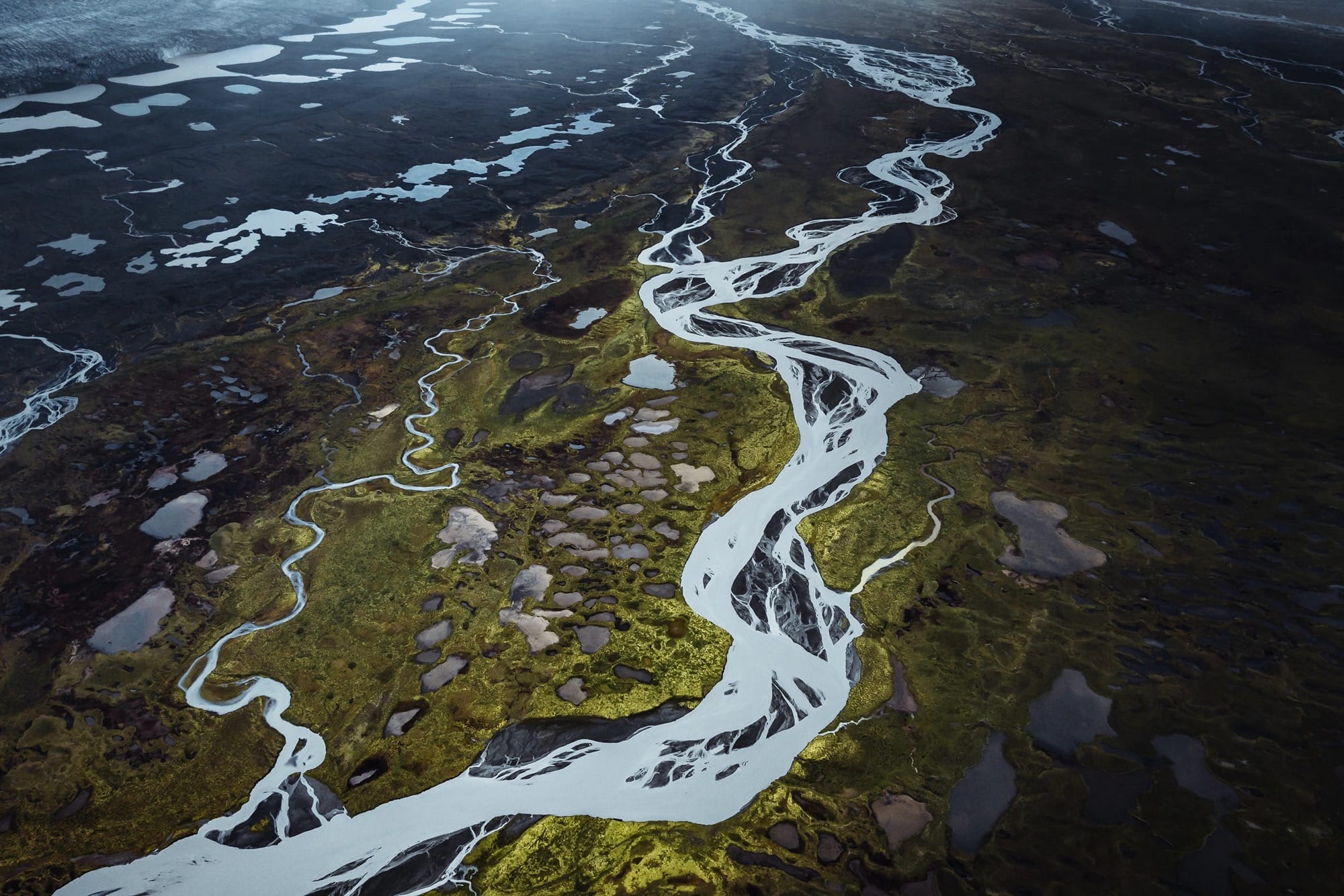 An aerial landscape of glacial streams in Iceland