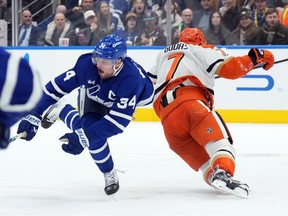 Toronto Maple Leafs Auston Matthews is injured by Anaheim Ducks Radko Gudas during second period NHL hockey action in Toronto on Thursday, March 12, 2026.