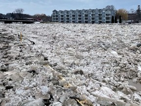 An ice jam caused the Bighead River to flow over the retaining wall near the harbour in Meaford on Saturday. Photo supplied by Vanessa Knight