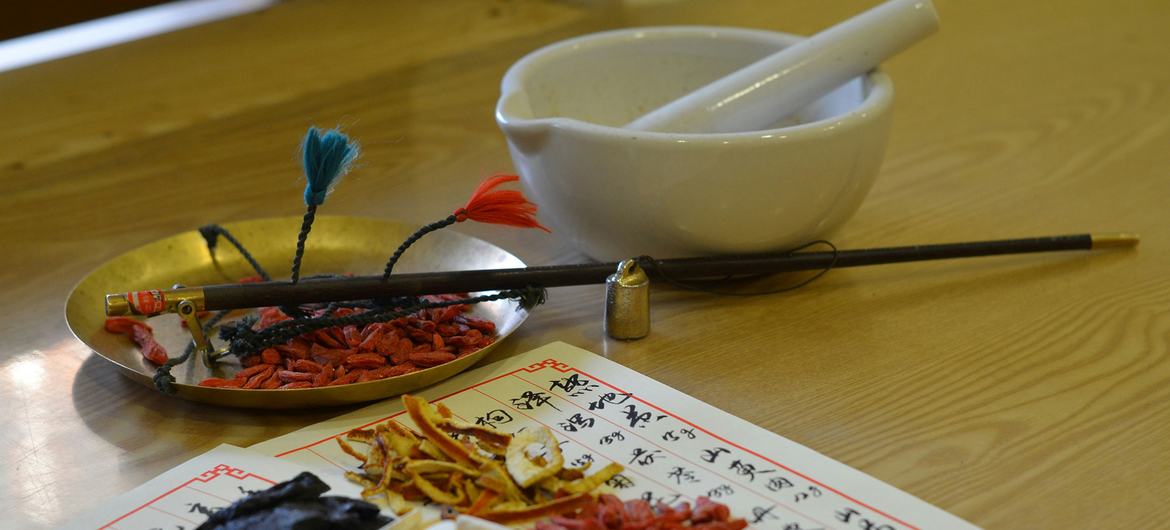 The ingredients for a traditional Chinese medicinal remedy are prepared.