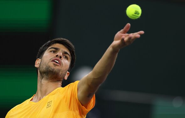 Carlos Alcaraz serves at BNP Paribas Open 2026