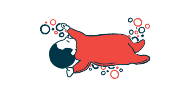 An infant lies on their back, napping.