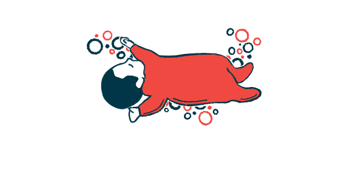 An infant lies on their back, napping.