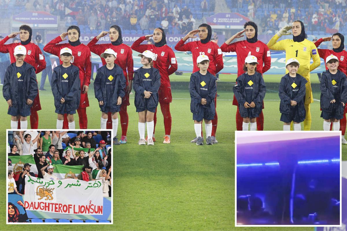 Iranian women’s soccer players flash 'help' signal after being branded traitors