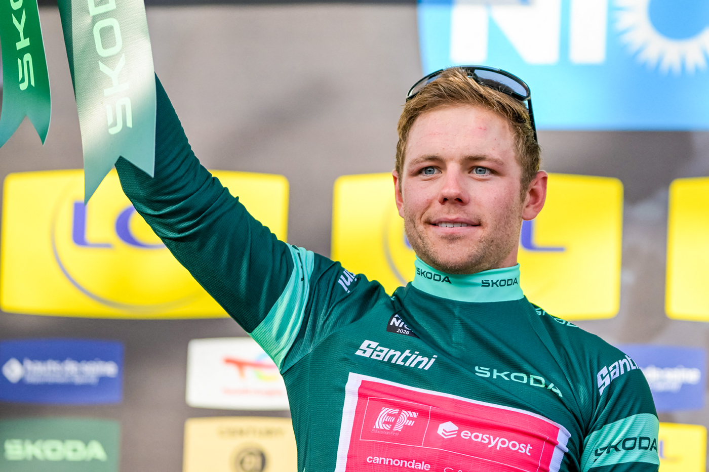 American Luke Lamperti of EF Education-EasyPost celebrates on the podium in the green points jersey the sixth stage of 84th edition of the Paris-Nice cycling race, a race from Barbentane to Apt (179,3 km), on Friday 13 March 2026. BELGA PHOTO DAVID PINTENS (Photo by DAVID PINTENS / BELGA MAG / Belga / AFP via Getty Images)