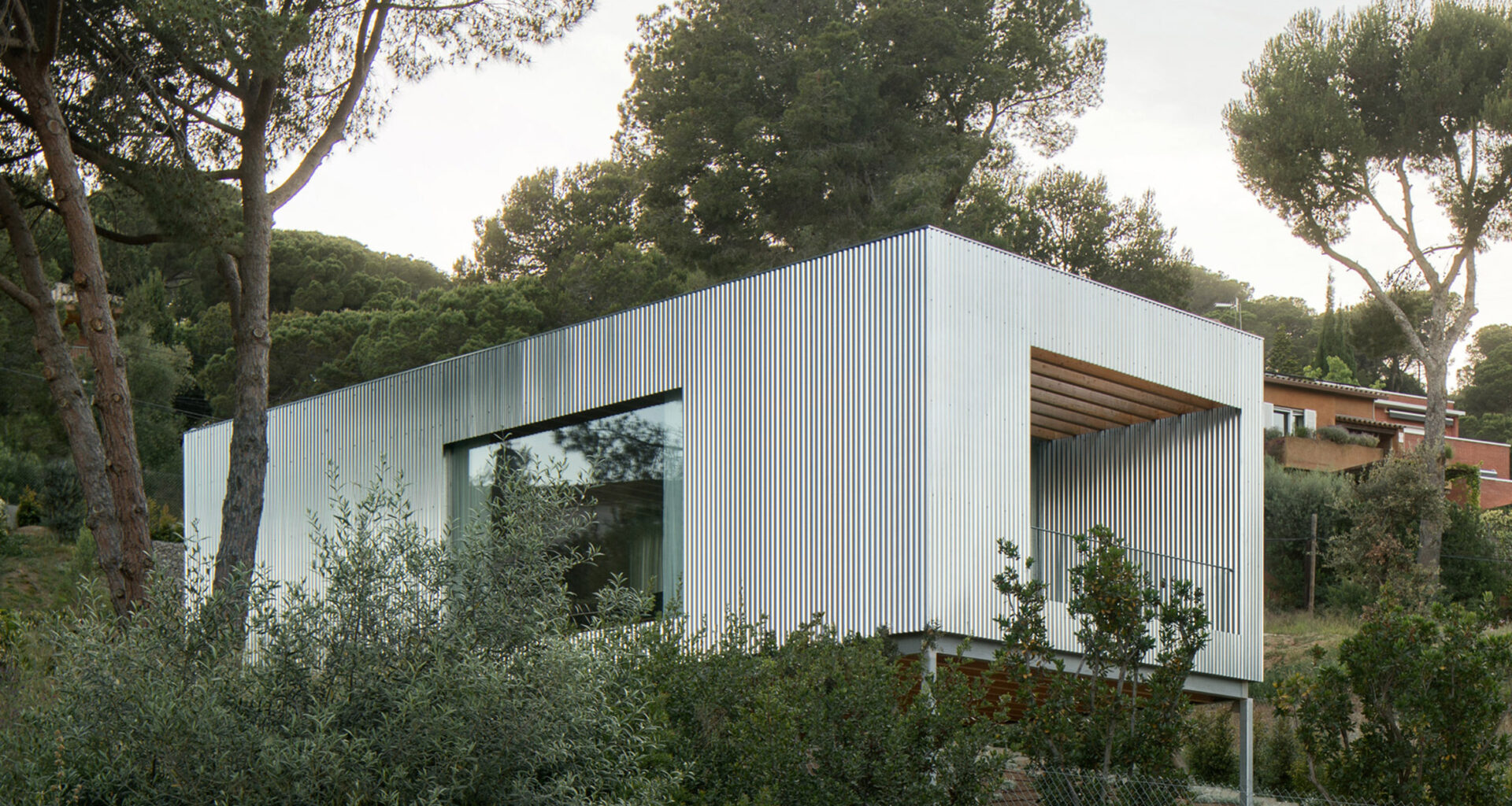 Coastal home in Barcelona perched on steel supports