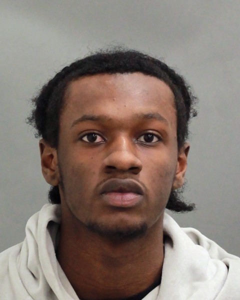 Man arrested in firearms probe was wanted for 2025 shootings linked to tow truck turf war