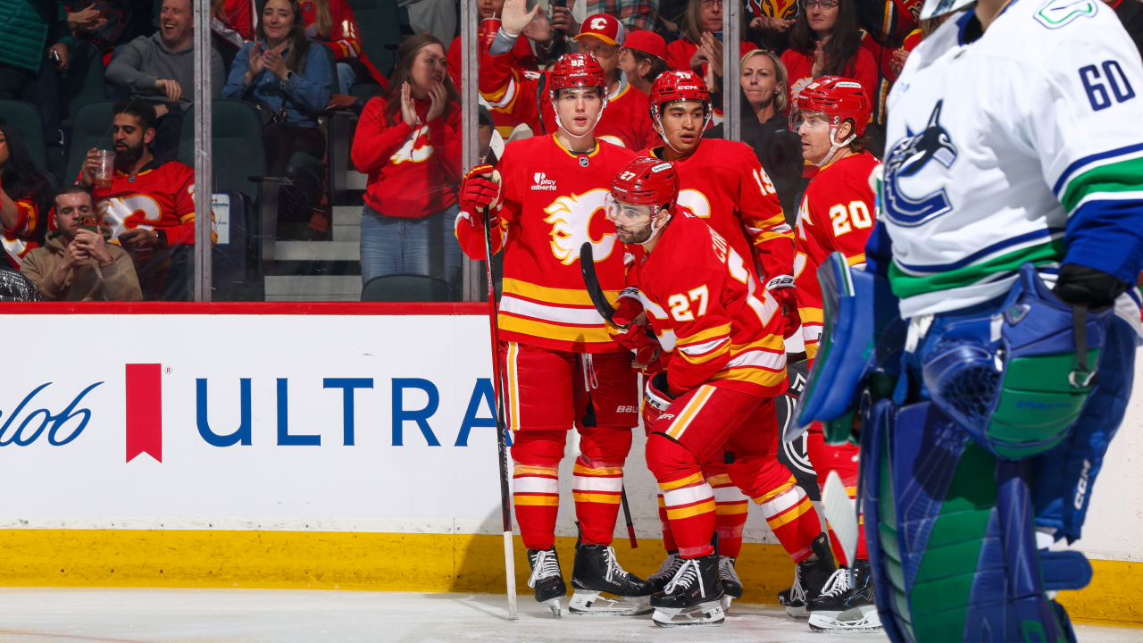Flames ease past Canucks, push point streak to 6