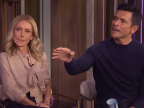 Kelly Ripa and Mark Consuelos reacting to Howie Mandel in awkward segment of Live with Kelly and Mark.