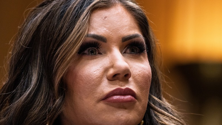 Kristi Noem with dark pink lipstick