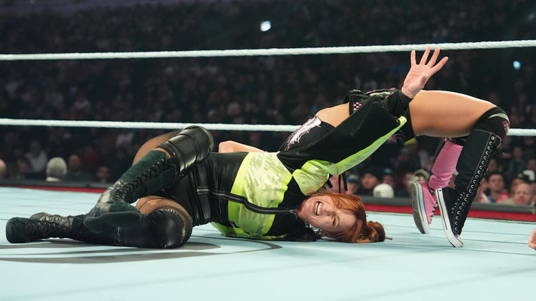 Becky Lynch struggles in a submission hold