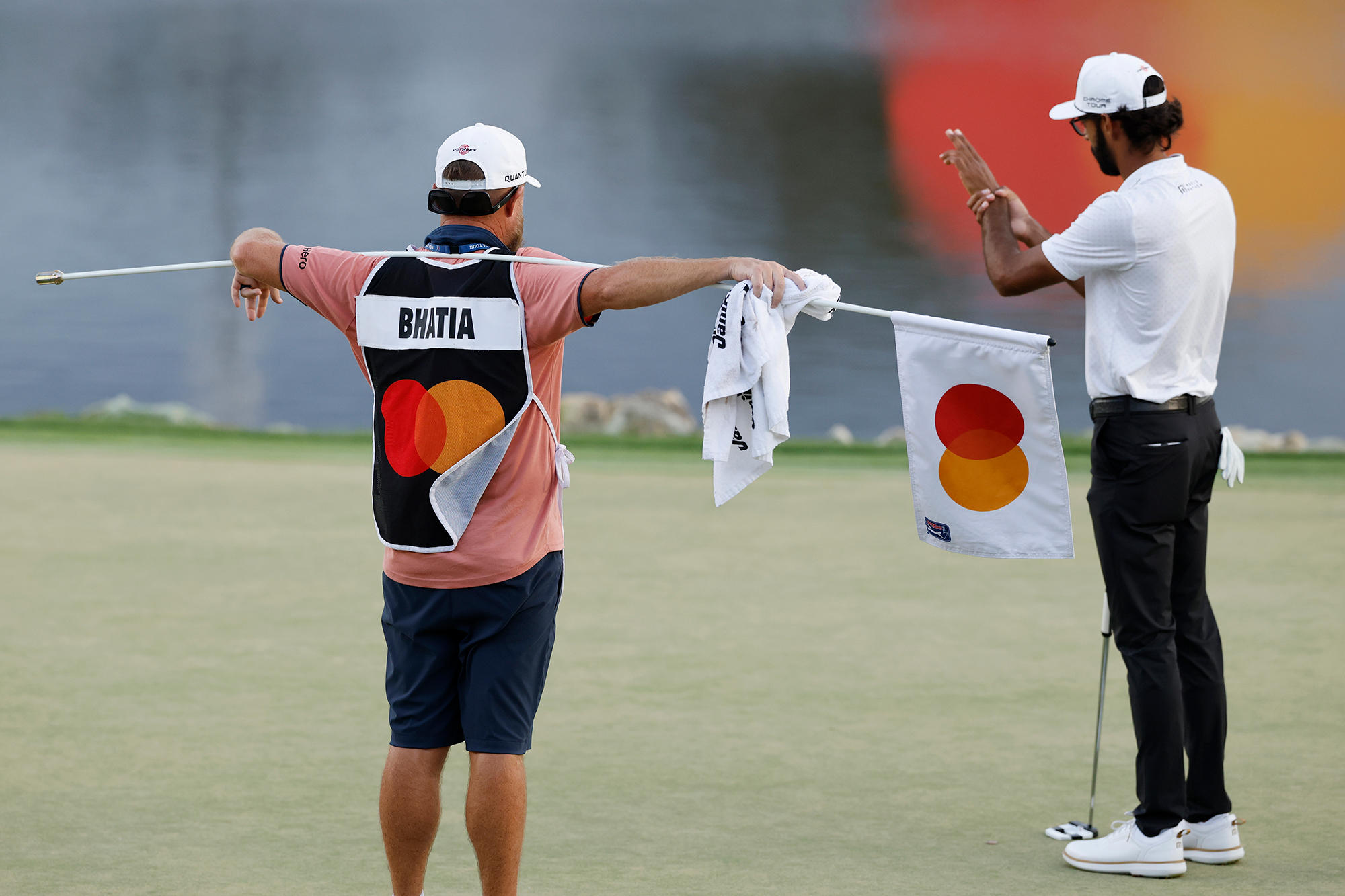 Akshay Bhatia using AimPoint to read a putt on the 18th green at the Arnold Palmer Invitational on his way to winning the title