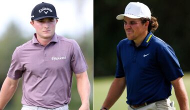 Blades Brown and John Daly II walk off the green