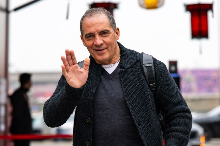 Marco Antonelli walks in the paddock.