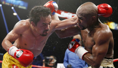 Manny Pacquaio (left), pictured here during a boxing match against Floyd Mayweather Jr. in 2015. (John Locher/AP)