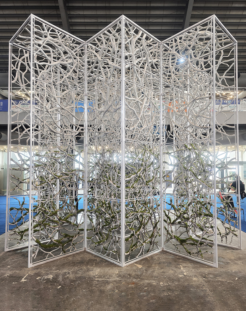 recycled paper waste turns into a branch-like lattice in a living spatial installation - 3