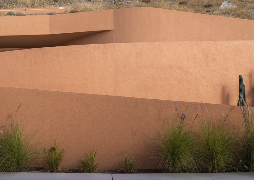 olen resort embeds into greek island slope across three terraced levels - 8