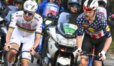 UAE Team Emirates's Slovenian rider Tadej Pogacar (L) attacks to take the lead past Lidl-Trek's US rider Quinn Simmons (R), in the Passo Di Ganda ascent during the 119th edition of the Giro di Lombardia (Tour of Lombardy), a 238km cycling race from Como to Bergamo on October 11, 2025. (Photo by Marco BERTORELLO / AFP) (Photo by MARCO BERTORELLO/AFP via Getty Images)