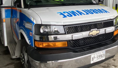 Emergency vehicles and police at the scene of a car accident at Erin Mills Parkway and Dundas Street West.