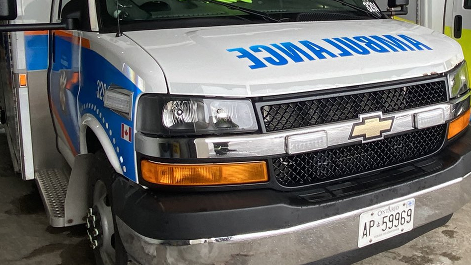 Emergency vehicles and police at the scene of a car accident at Erin Mills Parkway and Dundas Street West.