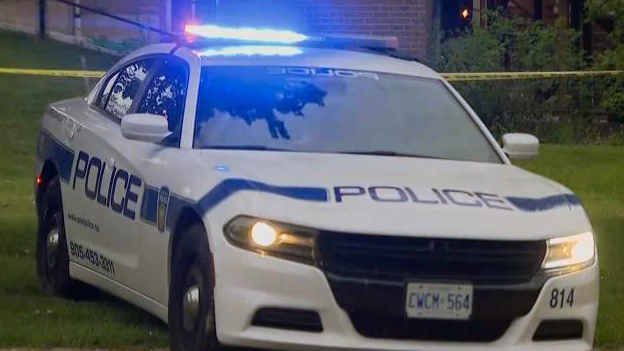 Police car parked near McLaughlin Road South and Oakley Boulevard in Brampton, related to a stabbing incident.