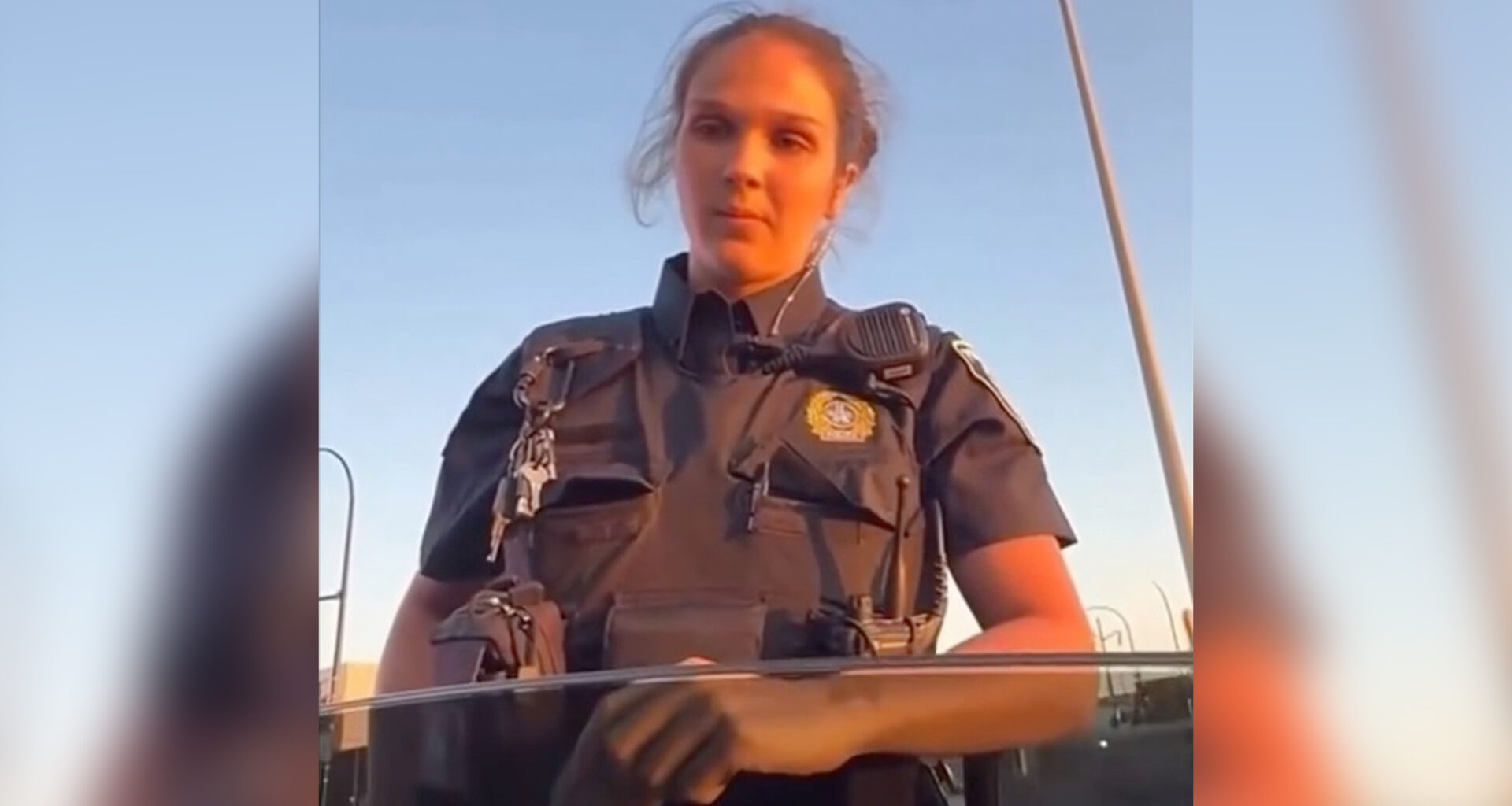 A Montreal police officer appears in a video taken out of a driver's side window