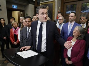 Artificial Intelligence and Digital Innovation Minister Evan Solomon speaks during a news conference on Parliament Hill in Ottawa on Wednesday, March 11, 2026.